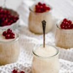 jars of tapioca pudding with red currants