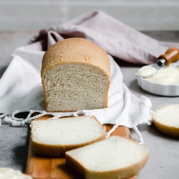 Honey White Bread sliced on cutting board