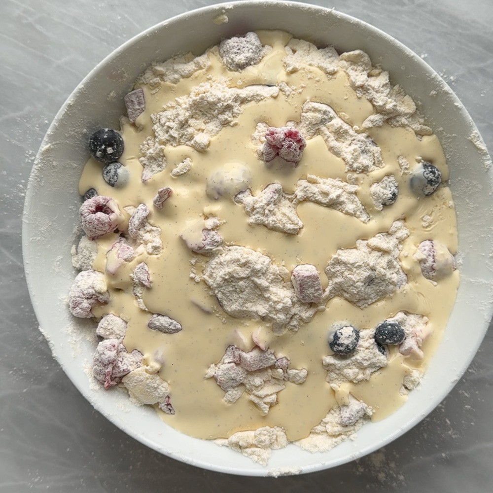 wet mixture drizzled over dry mixture