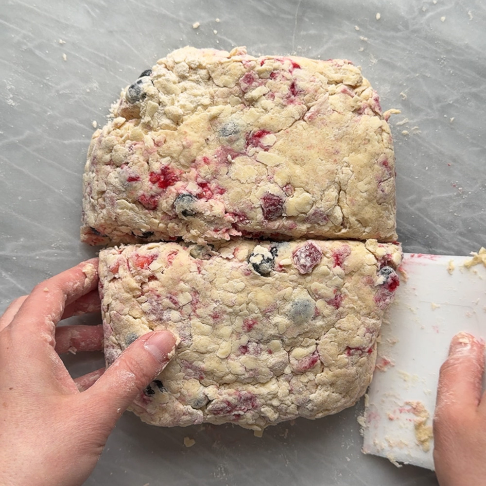 dough divided in half on work surface