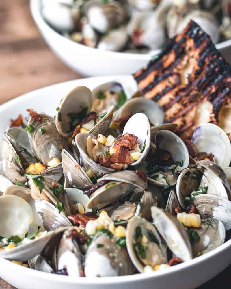 Garlic Butter Steamed clams in white bowl
