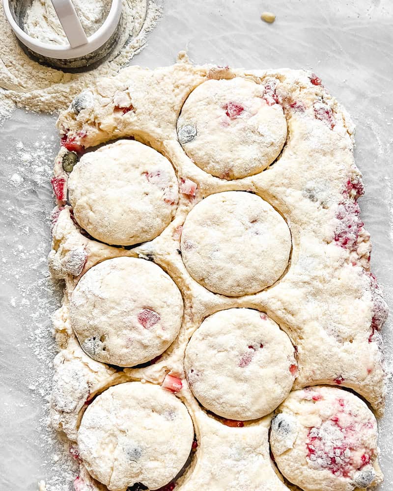 Scone dough cut out on marble surface