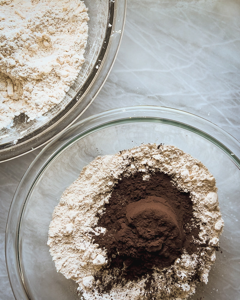 cocoa added to one bowl of scone dry ingredients