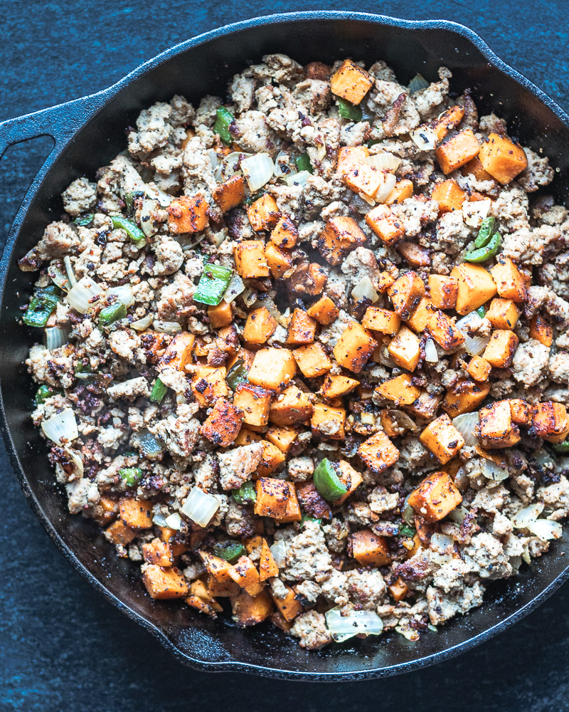 sweet potato added to cooked mixture in skillet