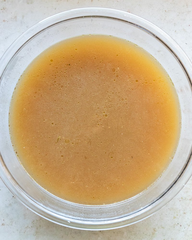 finished turkey broth in a glass bowl