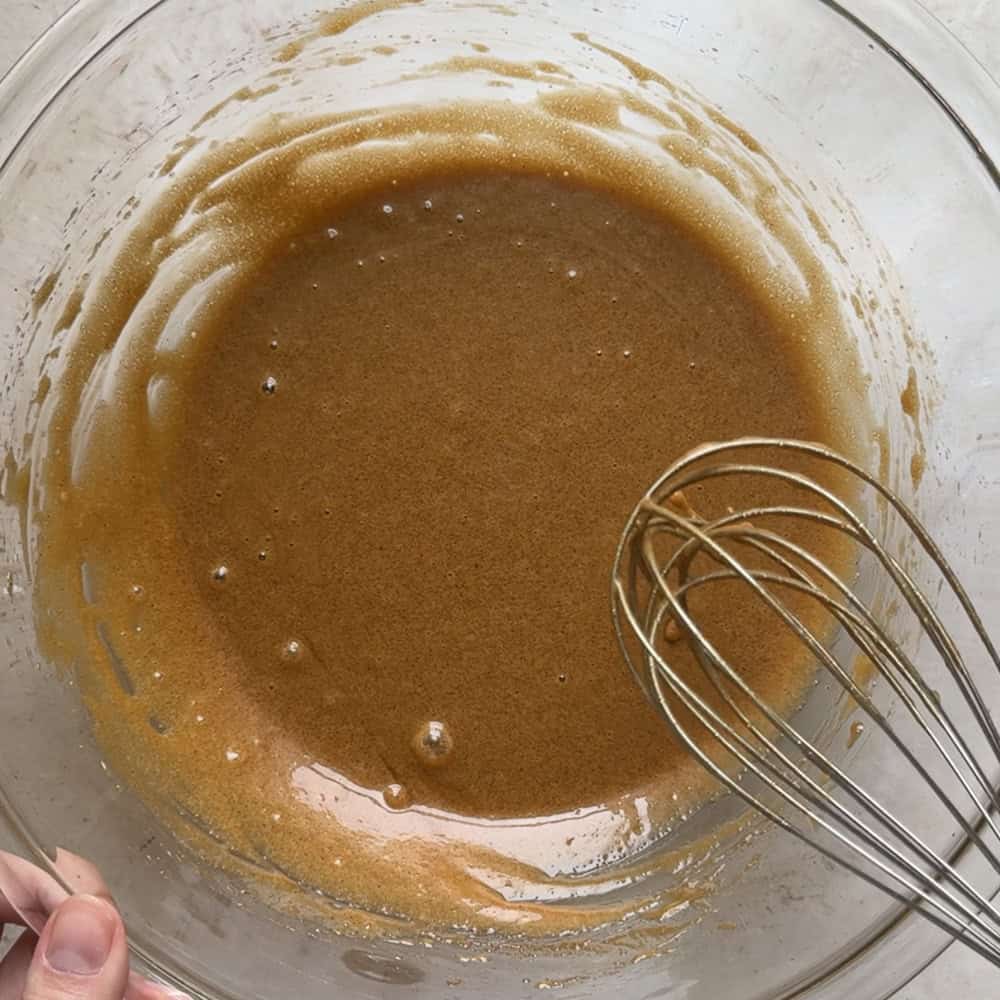 sourdough discard whisked into wet ingredients until the mixture is smooth and frothy