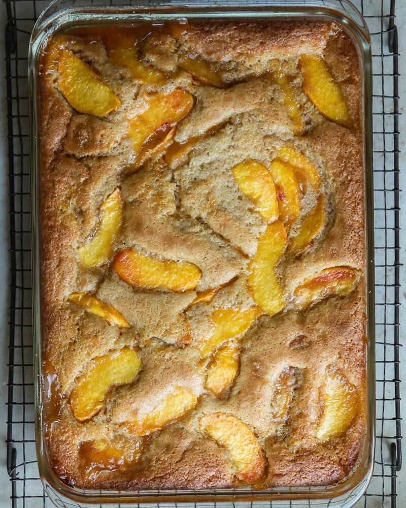 peach cobbler on wire cooling rack after baking