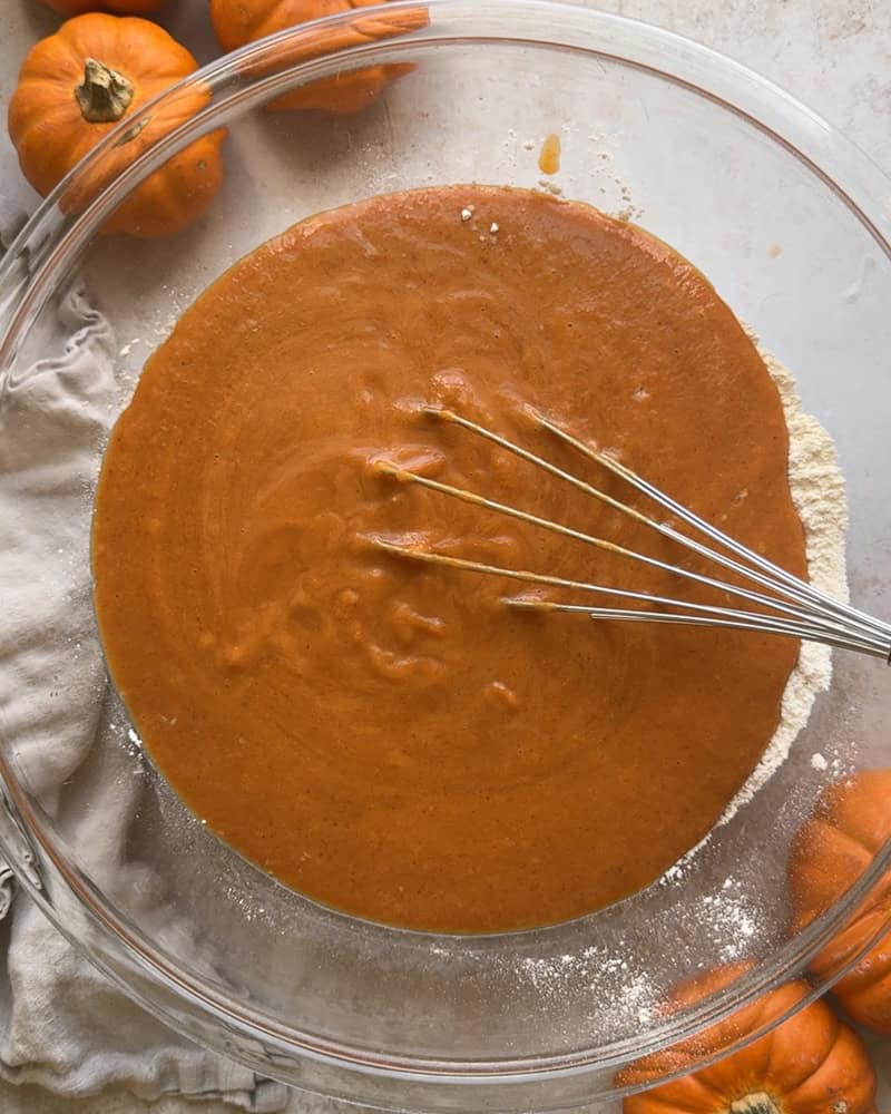 wet pumpkin mixture added to dry ingredients