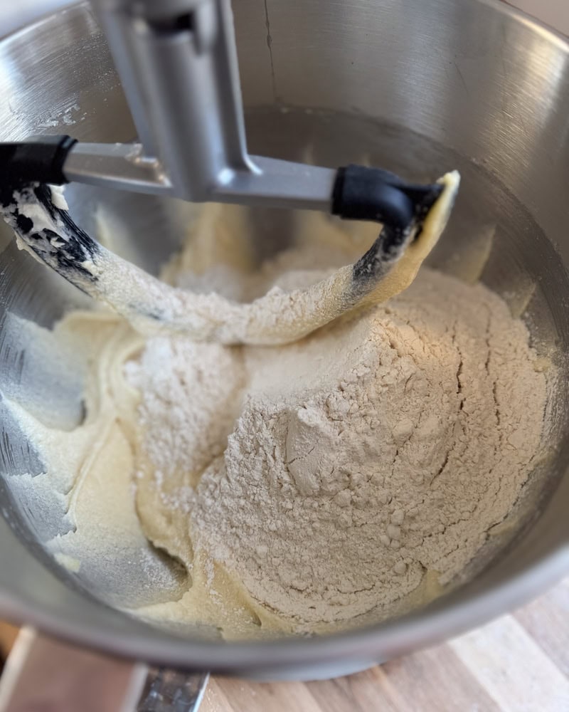 dry ingredients added to wet mixture in mixing bowl