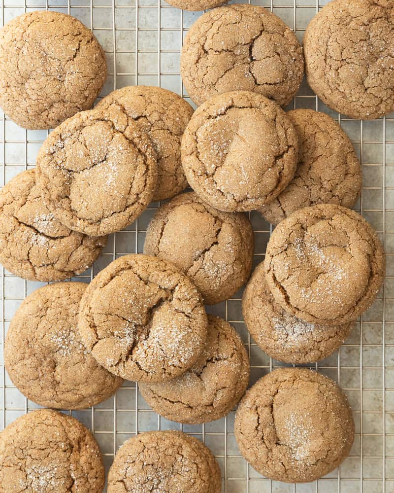 cookies arranged on top of a gold cooling rack