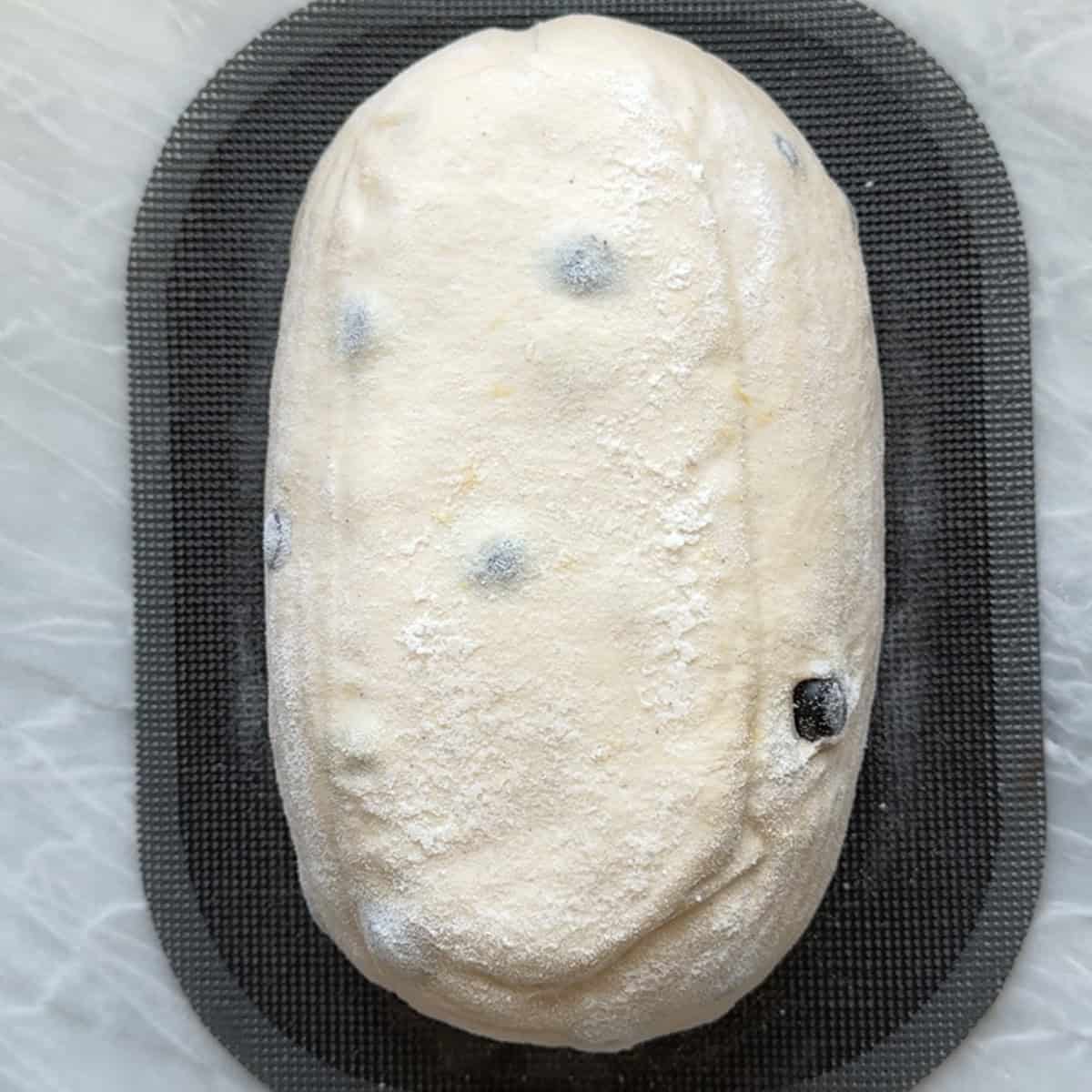 unscored loaf on silicone baking mat